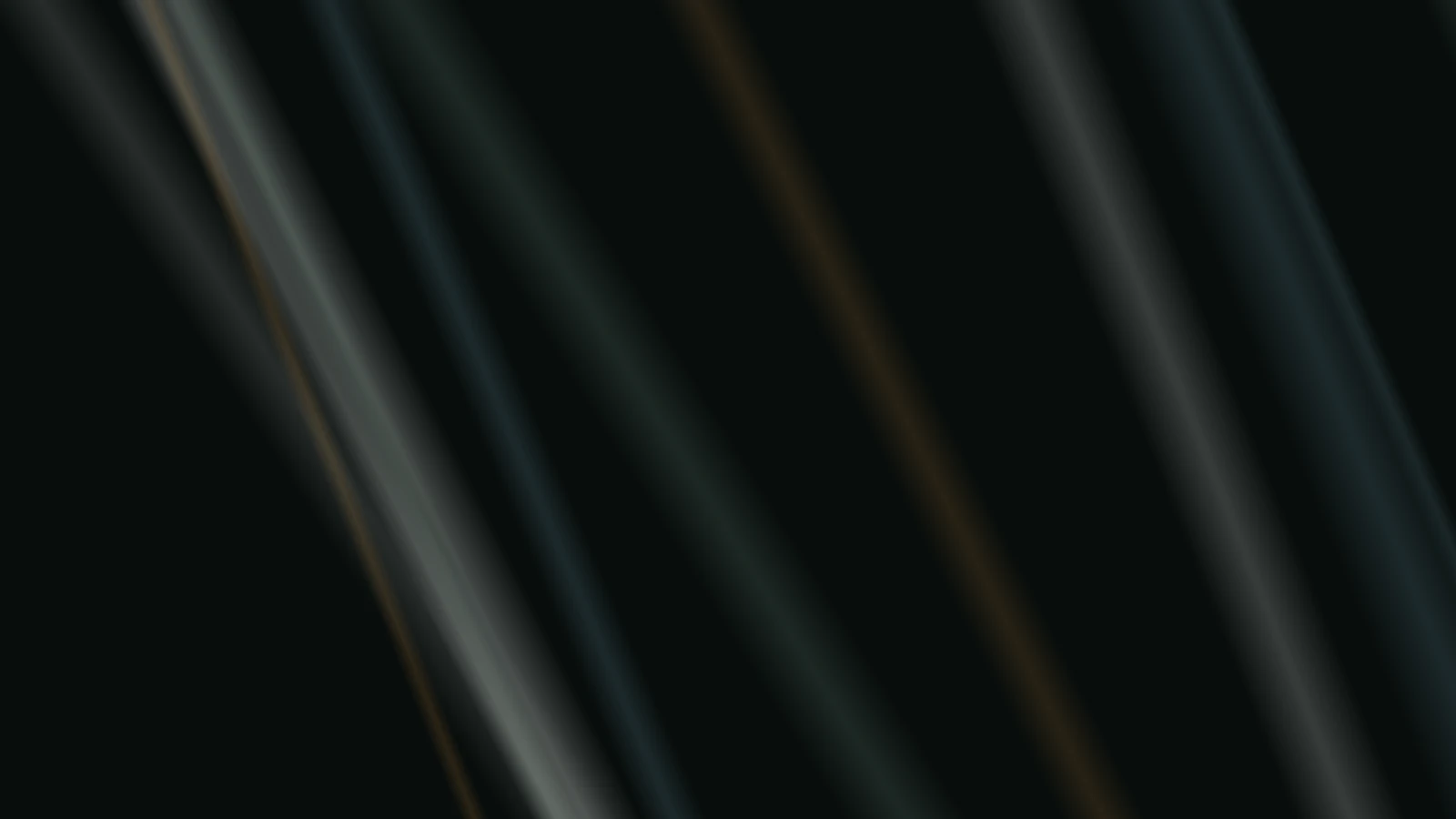 Luminous mint, silver and amber beams across a dark listening room